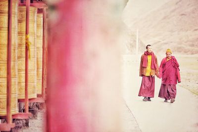 Monks walking at buddhist temple