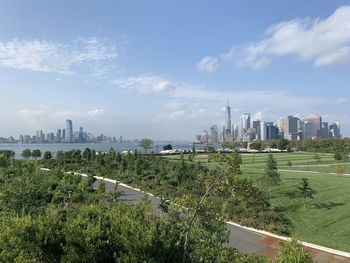 Modern buildings in city against sky