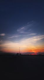 Scenic view of silhouette landscape against sky during sunset