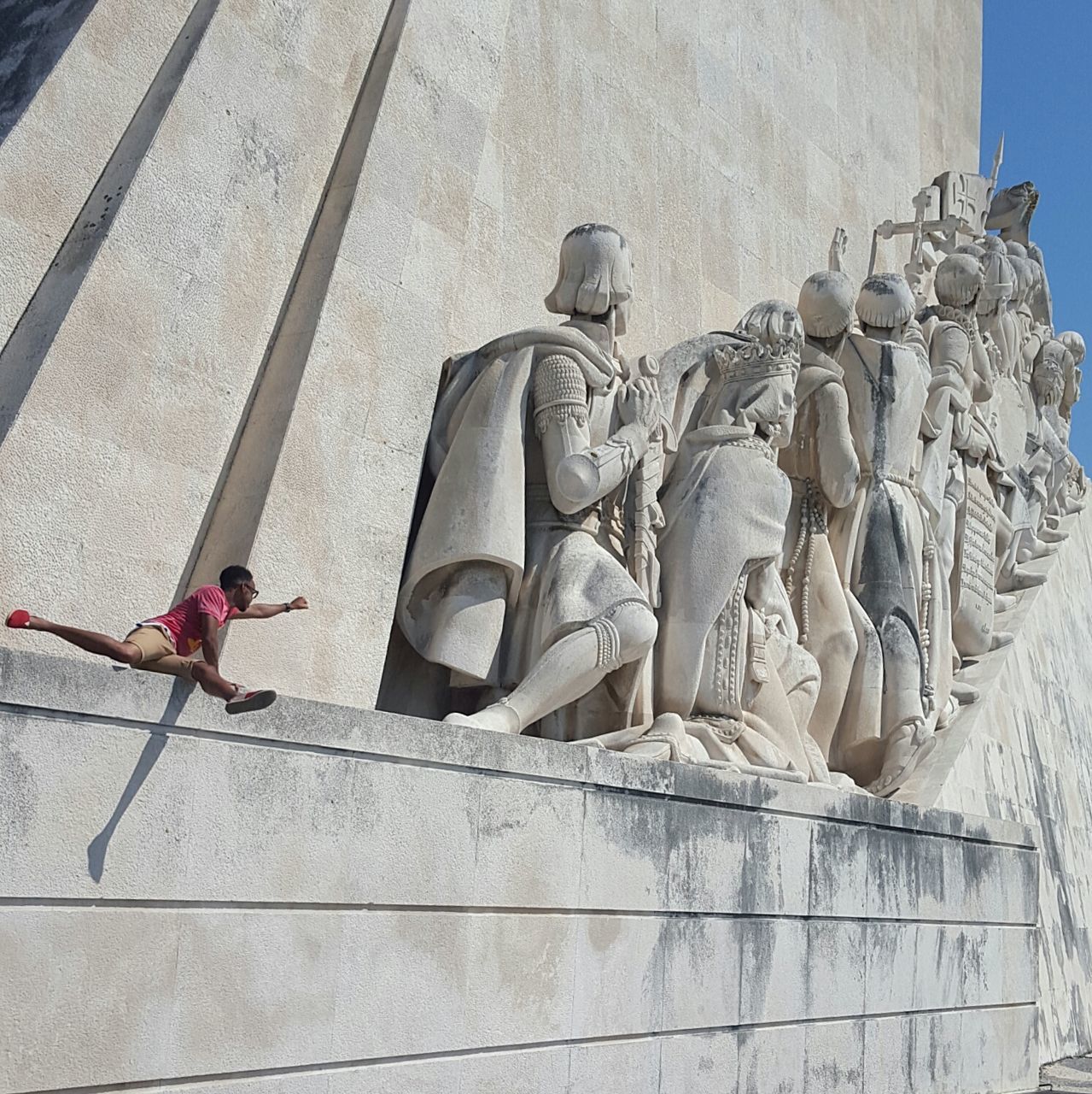 statue, sculpture, human representation, art and craft, art, creativity, sunlight, shadow, day, outdoors, low angle view, stone material, built structure, in a row, no people, animal representation, history, sunny