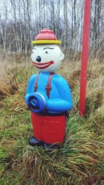 Red toy car on field
