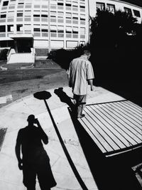 Woman standing on city street