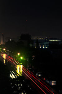 High angle view of light trails on city street at night