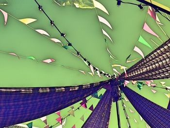 Low angle view of ferris wheel hanging from ceiling