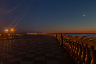 Scenic view of sea against sky at night