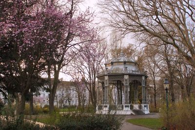 Trees in front of built structure