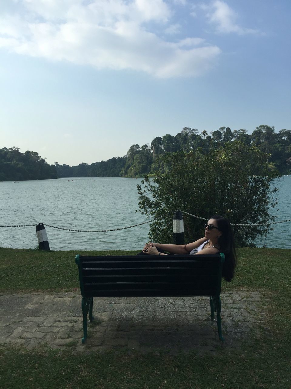 water, lifestyles, sitting, leisure activity, full length, rear view, tree, sky, bench, lake, relaxation, casual clothing, men, person, day, nature, tranquility, side view