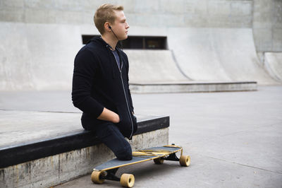 Handicapped man on skateboard