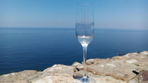 Scenic view of sea against blue sky