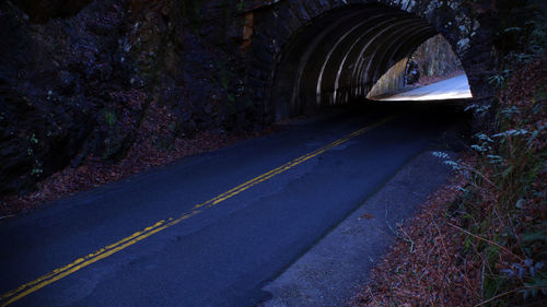 Road leading towards tunnel