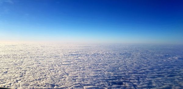 Scenic view of clouds over blue sky