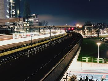 High angle view of railroad tracks at night