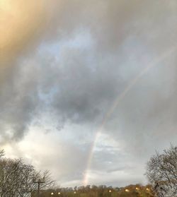 Low angle view of rainbow against sky