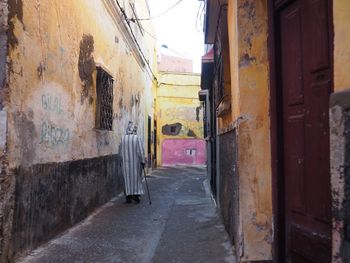 Alley amidst old building
