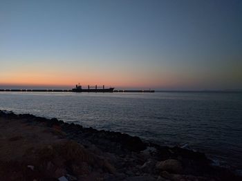 Scenic view of sea at sunset