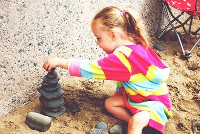 Girl playing with toy