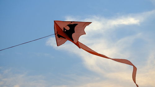 Low angle view of flag against sky