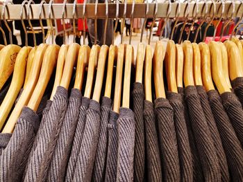 Close-up of clothes hanging on rack