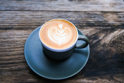 High angle view of cappuccino on table