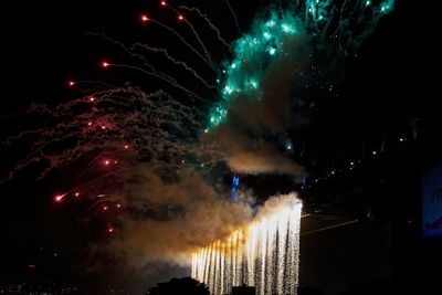 Low angle view of firework display