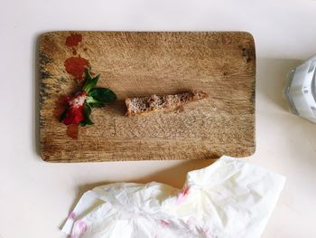 High angle view of leftovers food on cutting board