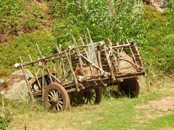 Rusty bicycle on field