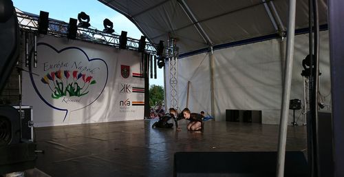 People sitting in illuminated building