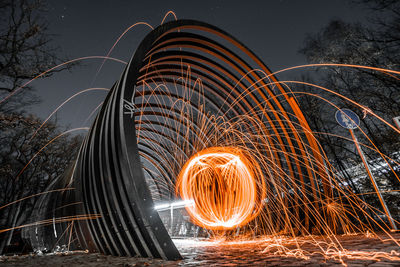 Light trails on fire crackers at night