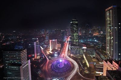 Illuminated cityscape at night