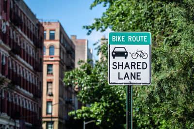 Information sign on road in city