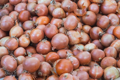 Full frame shot of onions for sale