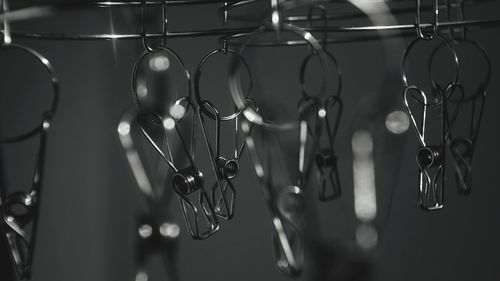 Close-up of clips hanging at home