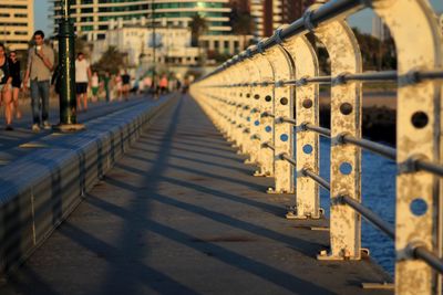 Railing on footbridge over river