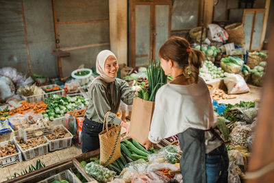 Group of friends in market