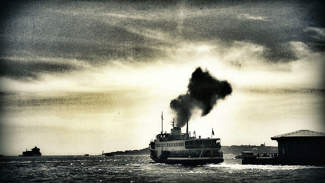 nautical vessel, transportation, mode of transport, water, waterfront, boat, sea, sky, sailing, cloud - sky, silhouette, nature, cloudy, ship, scenics, beauty in nature, weather, travel, sunset, tranquil scene