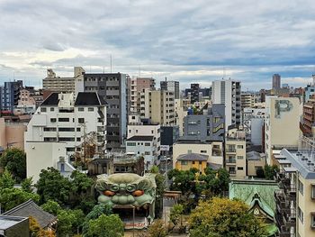 High angle view of buildings against sky