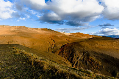 Yellow mountains on lake myvatn near husavik in nordurping municipality in iceland