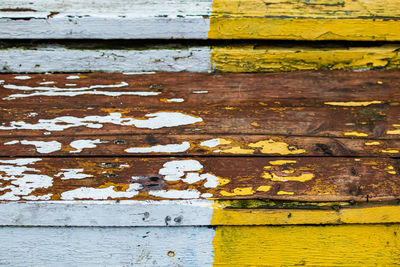 Wooden texture with peeling paint. close-up of old painted surface. selective focus.