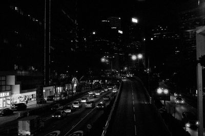 Traffic on city street at night