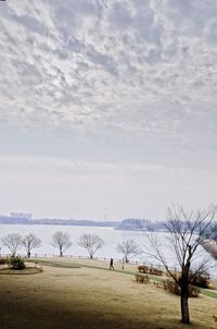 Scenic view of sea against cloudy sky