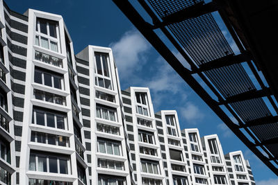 Low angle view of modern buildings against sky