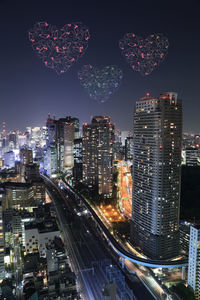 Digital composite image of illuminated buildings in city at night