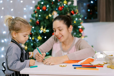 Portrait of young woman working at office