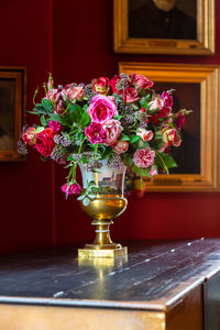 Vase with a beautiful fresh bouquet of flowers in the interior of frederiksborg castle.