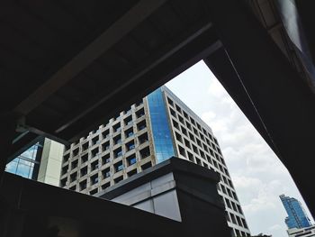 Low angle view of modern buildings against sky