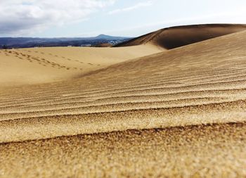 Scenic view of desert against sky