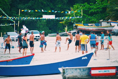 Friends playing at beach