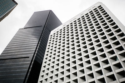 Low angle view of modern building against sky in city