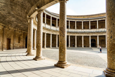 People walking in front of building