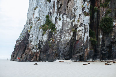 Panoramic view of rock formation against sky
